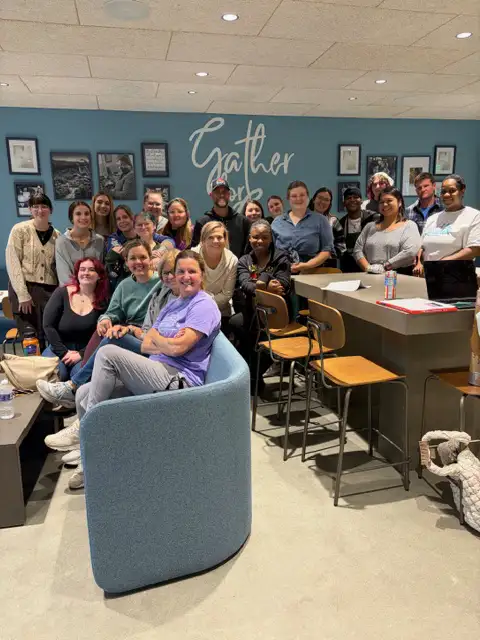 Interior of Second Helpings Café at The Front Porch in Memphis with people gathered together
