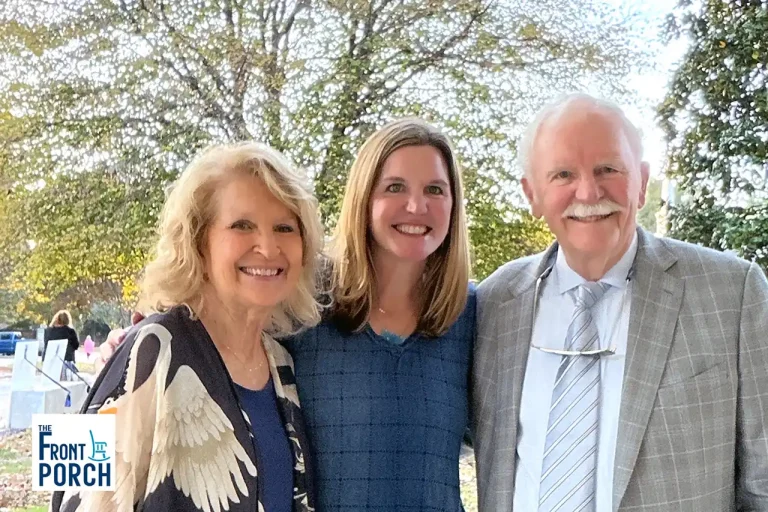 Lauren Young, owner of Sweet LaLa's Bakery and Second Helpings Café, with her parents at outdoor gathering