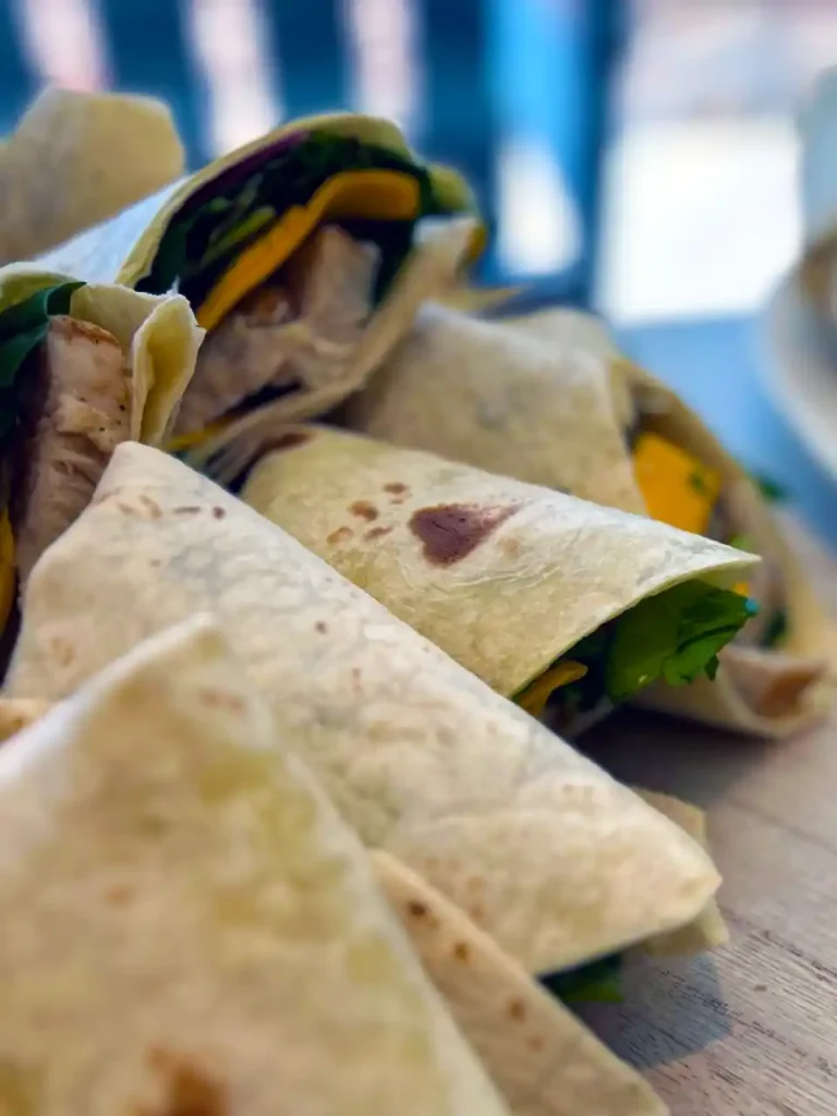 Fresh tortilla wraps filled with vegetables and protein at Second Helpings Café in Memphis